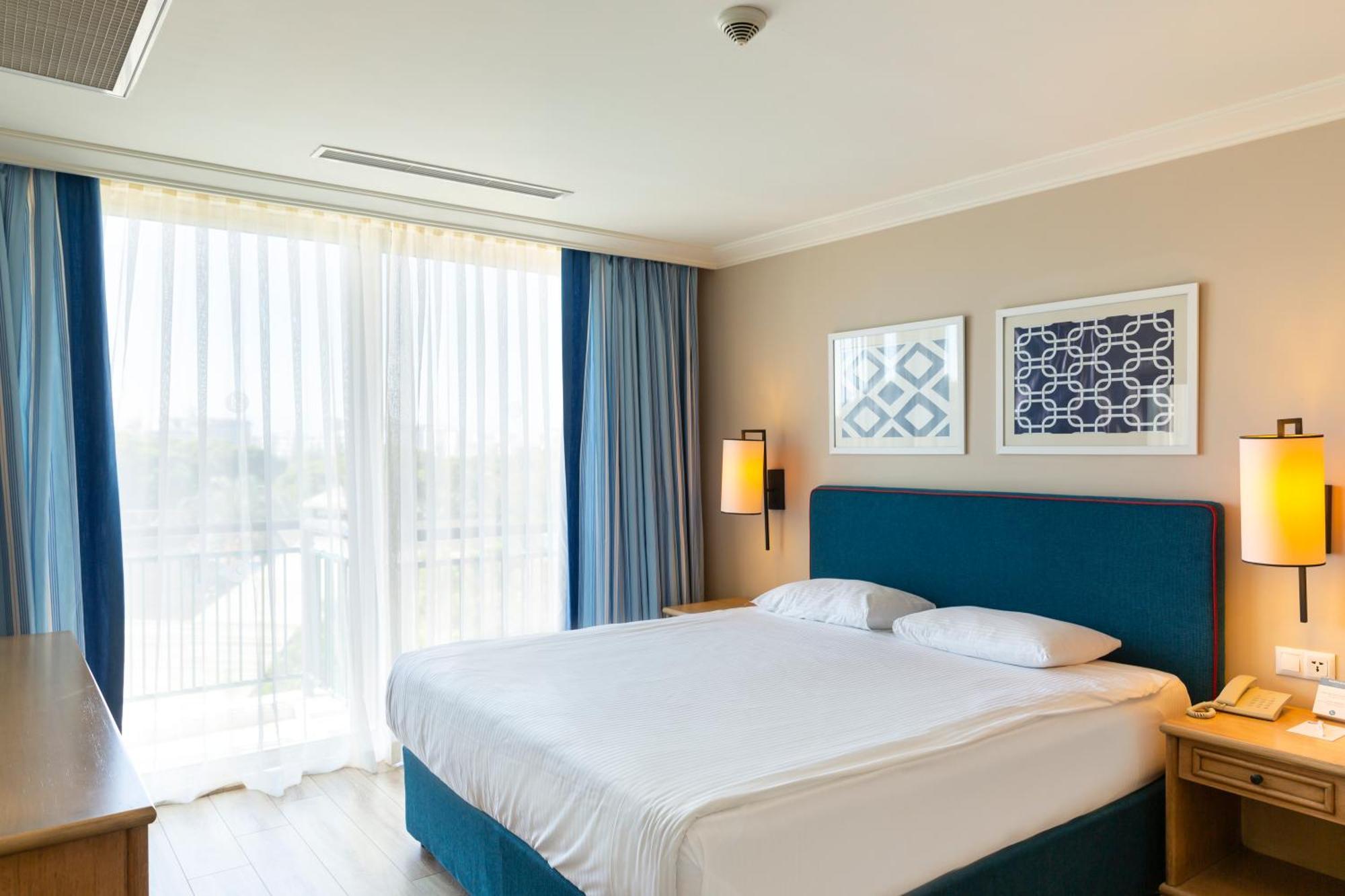 โรงแรมไอซี กรีน พาเลซ อันตัลยา ห้อง รูปภาพ A bedroom at the hotel